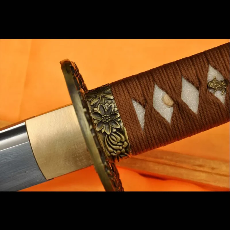 Close-up of white ray skin handle and brown ito wrapping