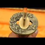 Butterfly and flower design tsuba on handmade Japanese sword
