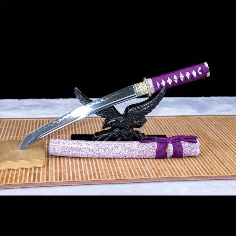 Full display of 1095 high carbon steel clay tempered hand forged tanto mounted on wooden stand